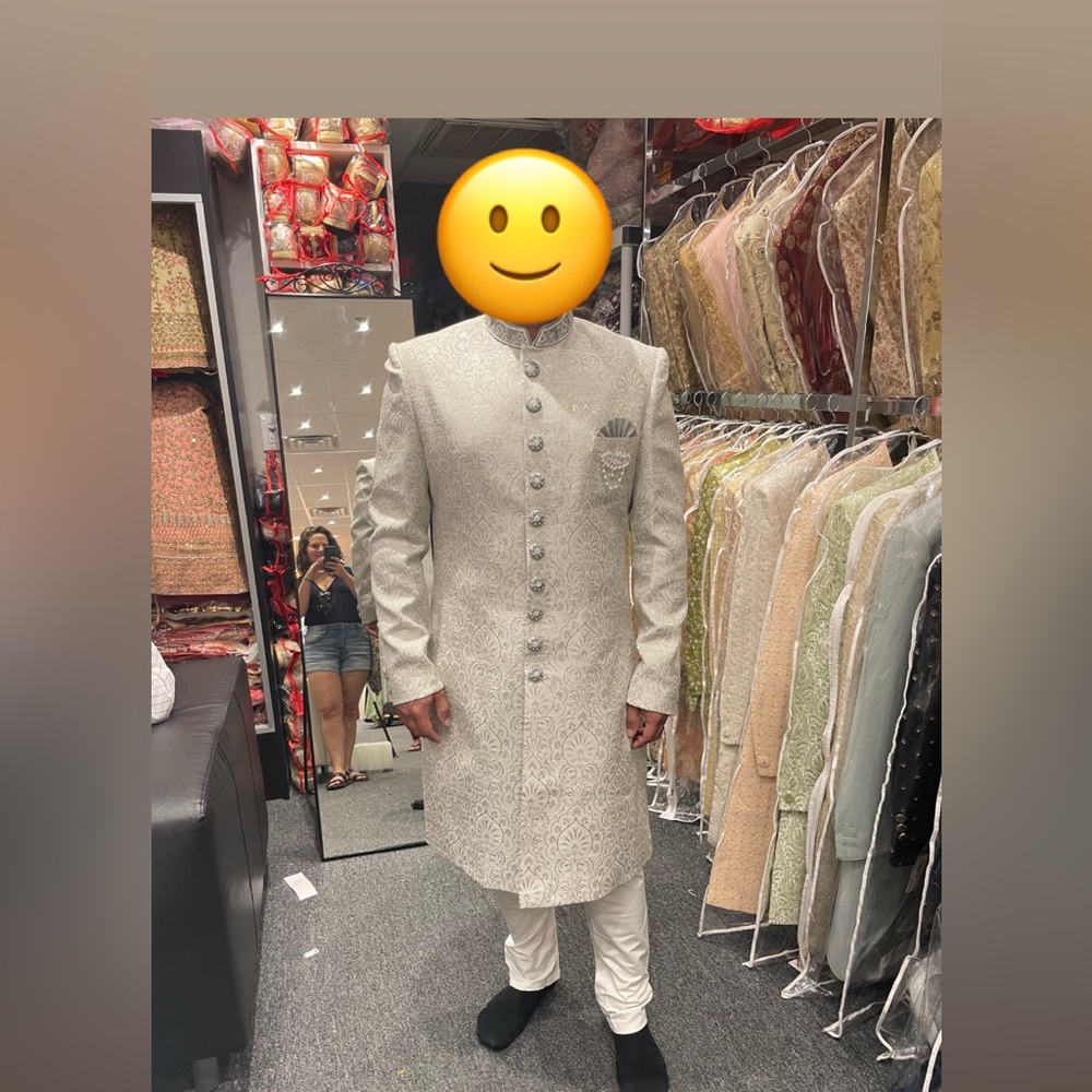 White groom’s sherwani
